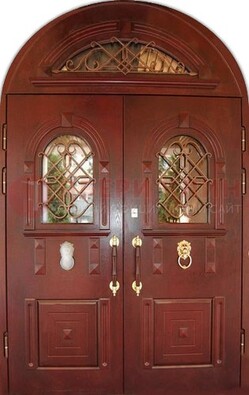 Стальная арочная дверь со стеклом и ковкой ДА-30 в дом из кирпича в Талдоме