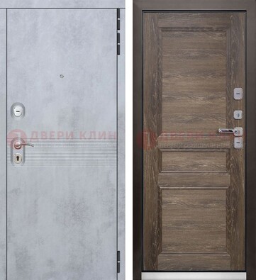 Серая металлическая дверь с МДФ коричневого цвета ДМ-304 в Талдоме