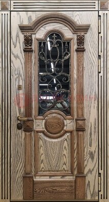 Железная дверь с массивом дуба со стеклом и ковкой ДМД-47 в Талдоме