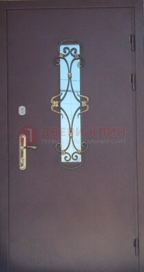 Металлическая дверь со стеклом и ковкой ДСК-77 в Талдоме